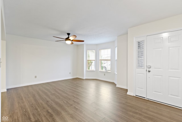 entryway featuring ceiling fan and dark hardwood / wood-style flooring