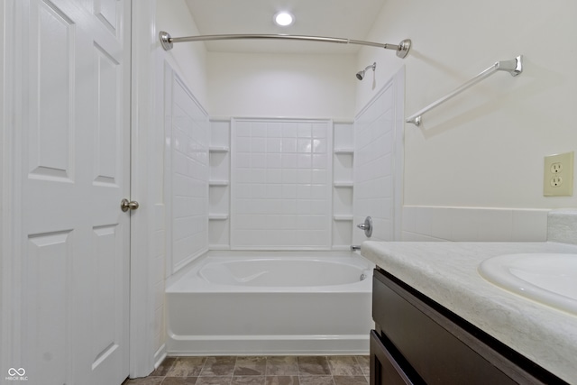 bathroom featuring shower / bathing tub combination and vanity