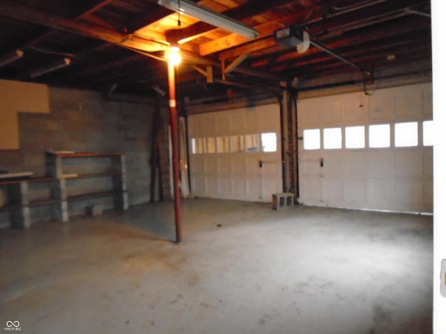 705 W 6th St, Seymour, IN 47274 - garage featuring a garage door opener