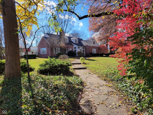 view of front of home with a front lawn