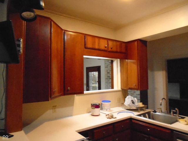 705 W 6th St, Seymour, IN 47274 - kitchen featuring light countertops, a sink, and ornamental molding