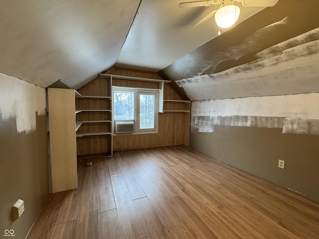 705 W 6th St, Seymour, IN 47274 - additional living space with wood-type flooring, vaulted ceiling, cooling unit, and a ceiling fan