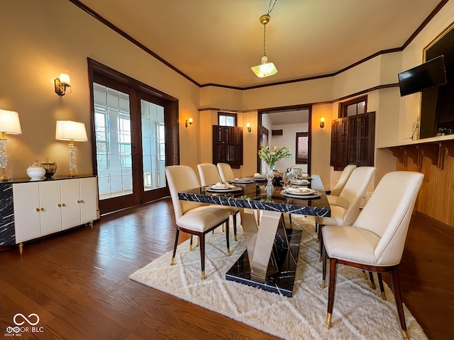 705 W 6th St, Seymour, IN 47274 - dining area with wood finished floors and ornamental molding