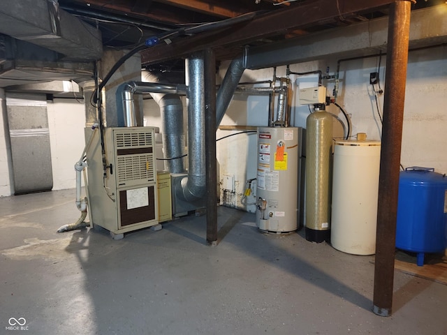 705 W 6th St, Seymour, IN 47274 - unfinished basement featuring water heater, a water softener system, and a water pressure tank