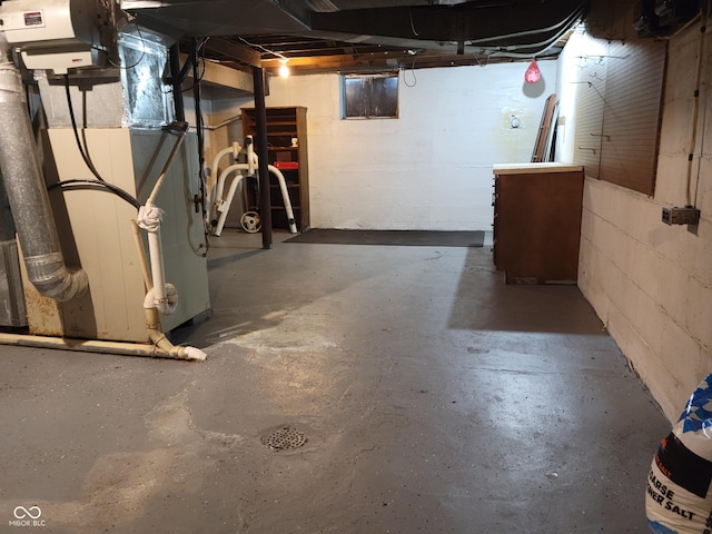 705 W 6th St, Seymour, IN 47274 - unfinished basement with concrete block wall and heating unit