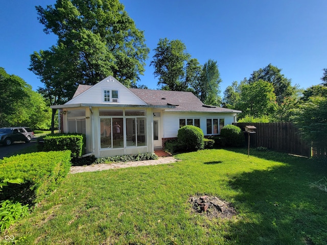 705 W 6th St, Seymour, IN 47274 - back of house with a sunroom