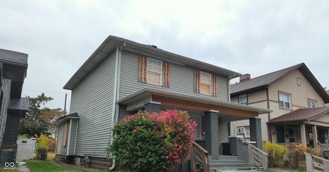 view of front property with covered porch