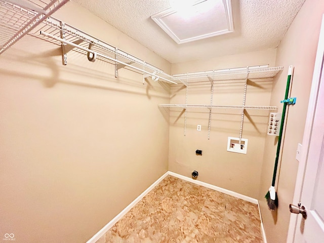 washroom featuring hookup for a washing machine and hookup for an electric dryer