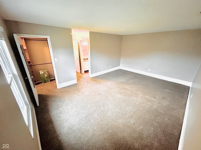 unfurnished bedroom with light colored carpet