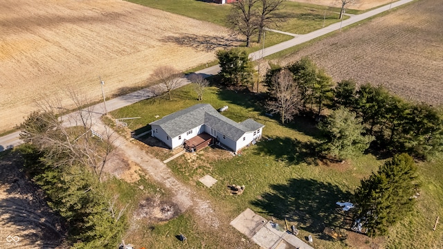 birds eye view of property featuring a rural view