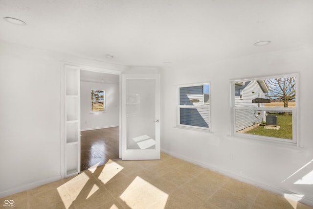 spare room featuring light hardwood / wood-style flooring