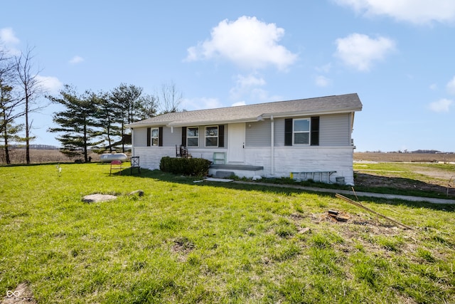 single story home featuring a front yard