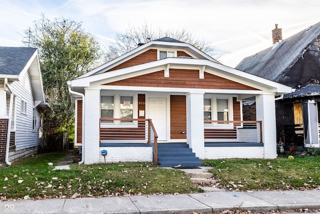 bungalow-style home with covered porch