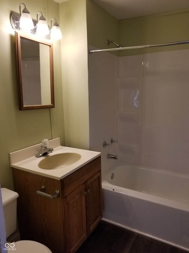 full bathroom featuring vanity, shower / bathing tub combination, and toilet