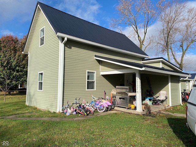 exterior space featuring a yard