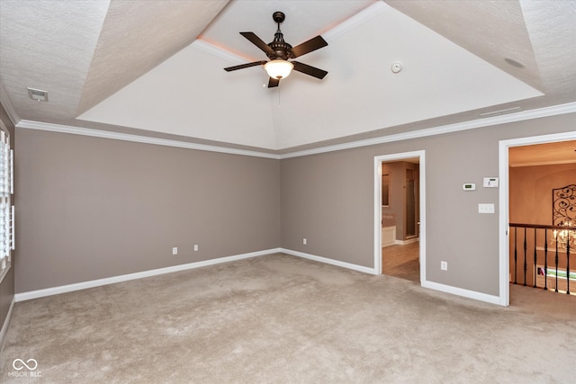 unfurnished bedroom with carpet floors, crown molding, visible vents, a textured ceiling, and baseboards