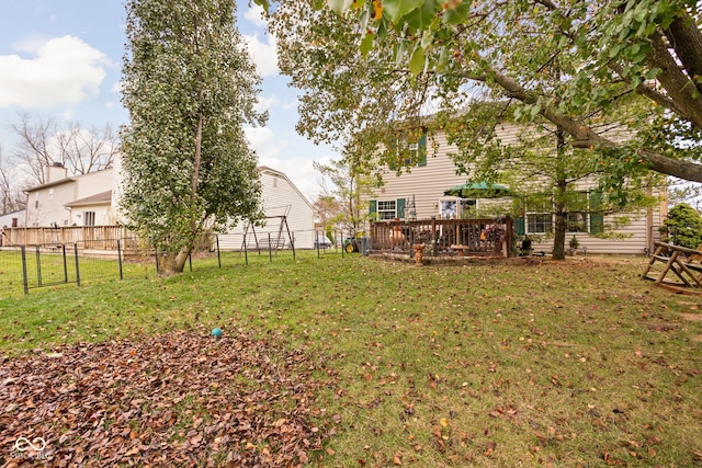 view of yard with a wooden deck