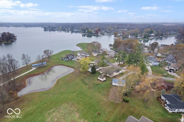 drone / aerial view with a water view