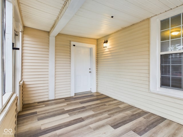 doorway to property with covered porch