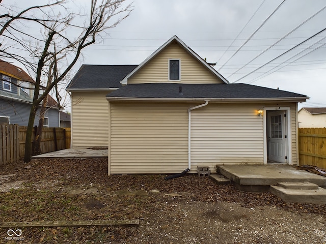 rear view of house featuring a patio