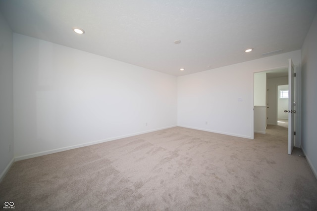 7904 Magnolia St, New Palestine, IN 46163 - unfurnished room featuring light carpet, recessed lighting, and baseboards