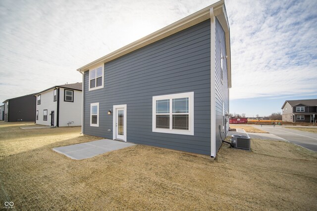 7904 Magnolia St, New Palestine, IN 46163 - back of house with cooling unit and a yard