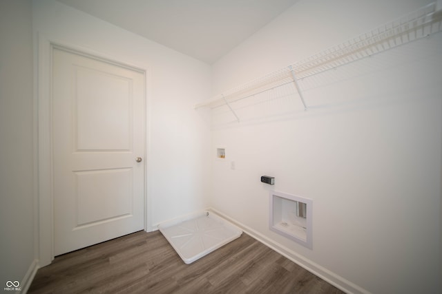 7904 Magnolia St, New Palestine, IN 46163 - laundry room featuring washer hookup, wood finished floors, baseboards, and hookup for an electric dryer