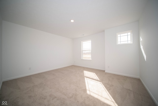 7904 Magnolia St, New Palestine, IN 46163 - unfurnished room with light carpet, baseboards, and recessed lighting