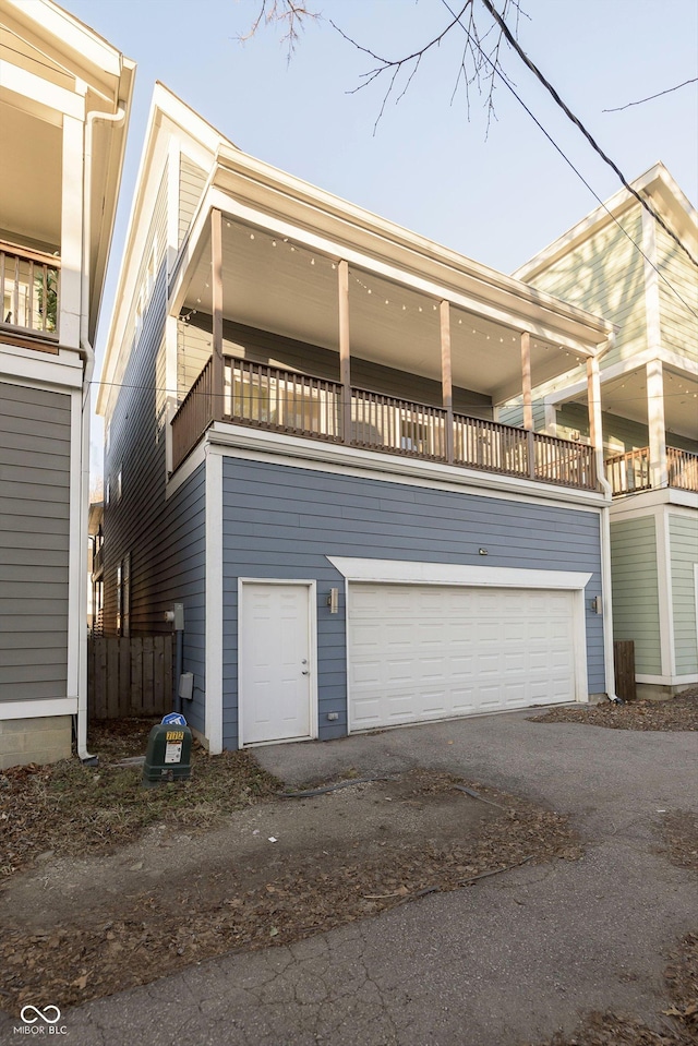 view of side of property featuring a balcony