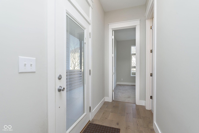 corridor featuring light wood-type flooring