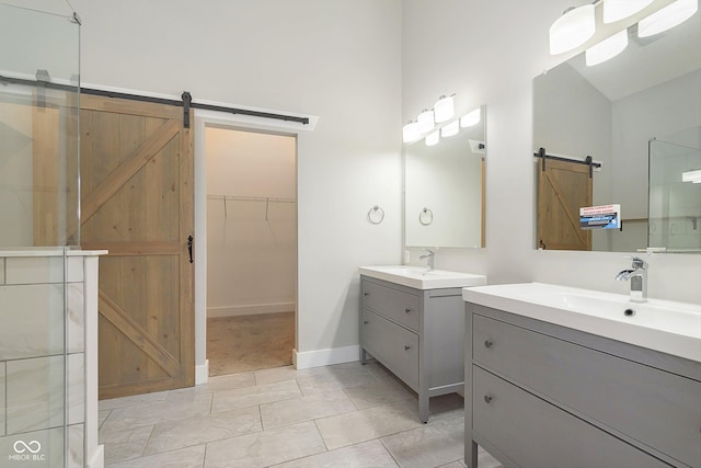 bathroom featuring tile patterned floors, vanity, a shower with shower door, and lofted ceiling