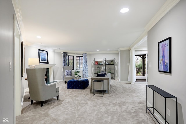 living room with a healthy amount of sunlight, light colored carpet, and ornamental molding