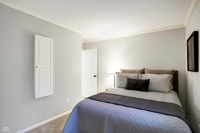 carpeted bedroom with crown molding