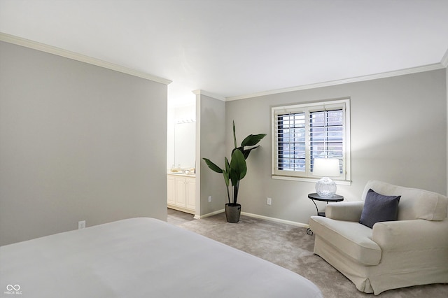 carpeted bedroom featuring ensuite bathroom and ornamental molding