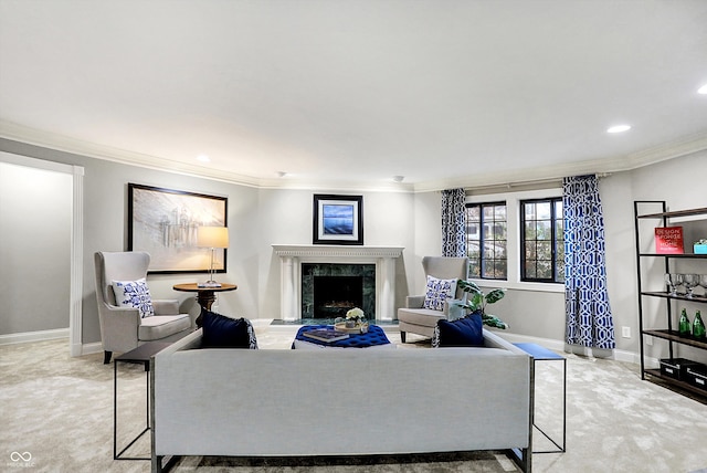 living room featuring a premium fireplace, crown molding, and light colored carpet