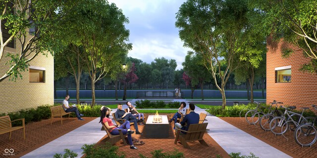 view of community featuring an outdoor fire pit