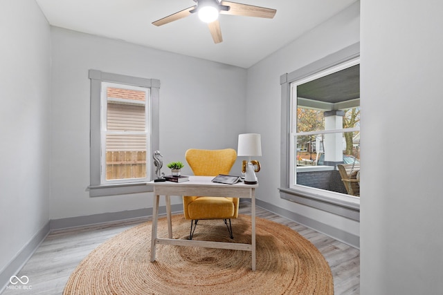 office area featuring ceiling fan and light hardwood / wood-style floors