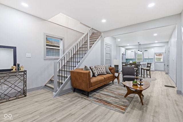 living room featuring light wood-type flooring