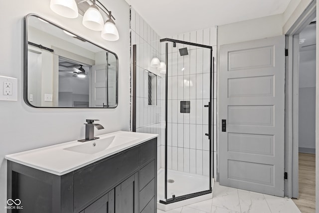 bathroom with vanity and an enclosed shower