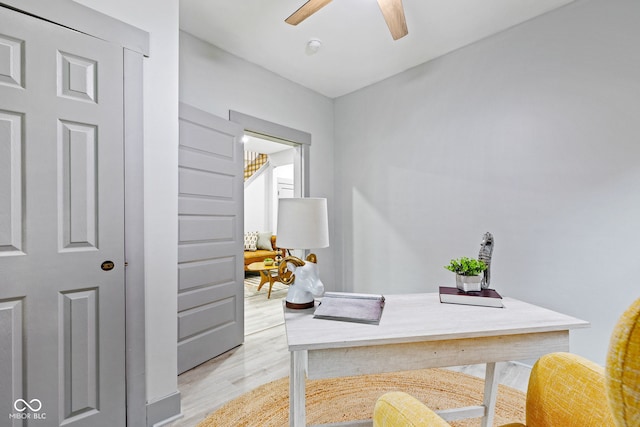 office featuring ceiling fan and light hardwood / wood-style floors