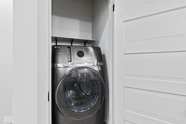 laundry area with washer / dryer