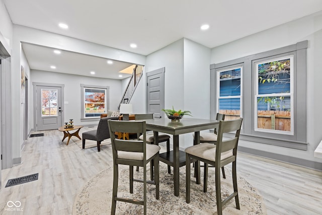 dining room with light wood-type flooring