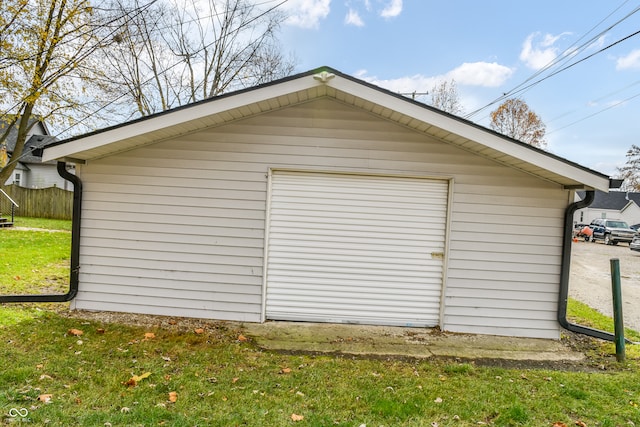 garage featuring a yard