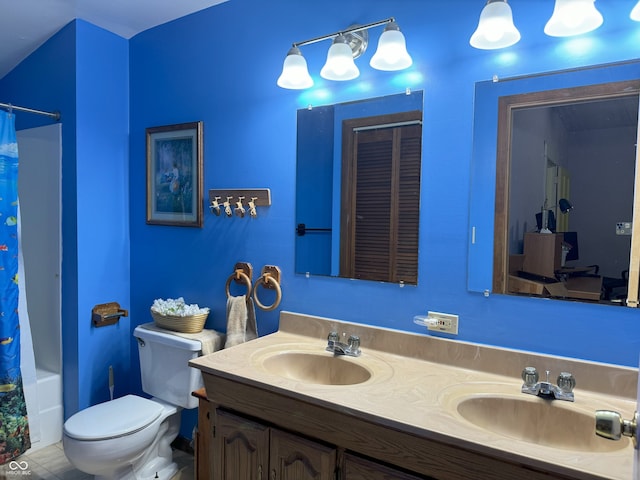 full bathroom with tile patterned flooring, shower / bath combo, vanity, and toilet