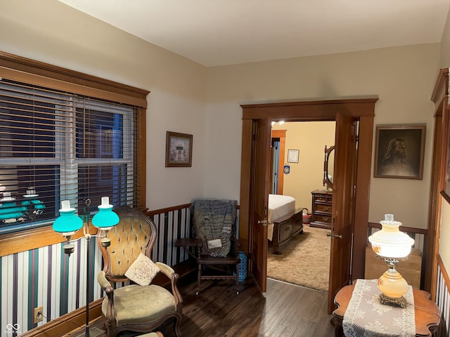 sitting room with dark hardwood / wood-style floors