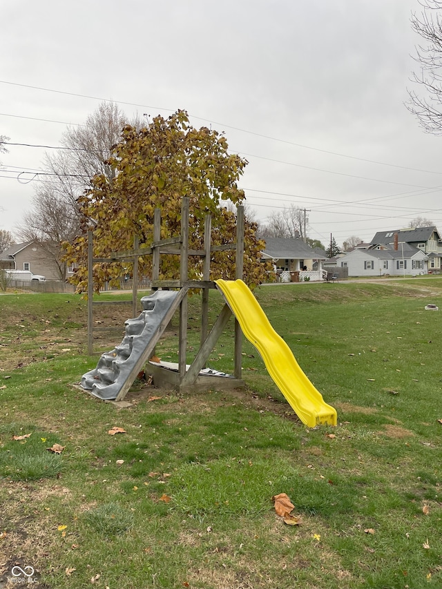 view of playground featuring a lawn