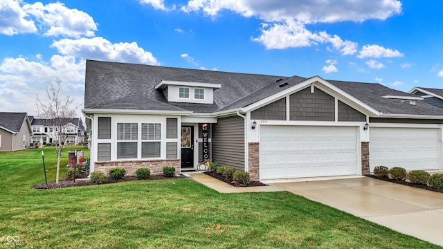 craftsman-style house with a front yard and a garage