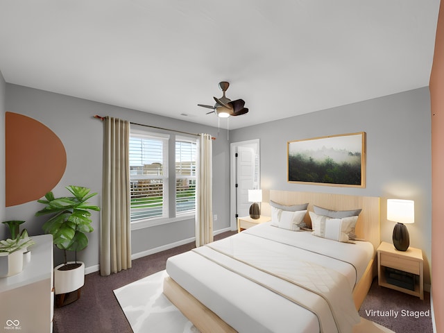 carpeted bedroom with ceiling fan