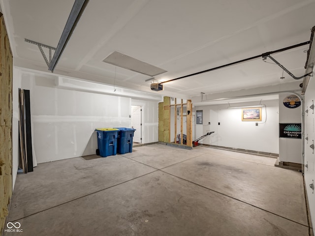 garage featuring a garage door opener