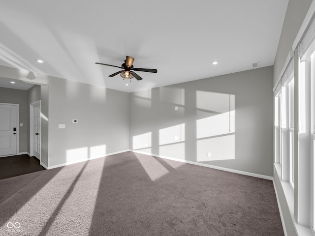 carpeted empty room with ceiling fan